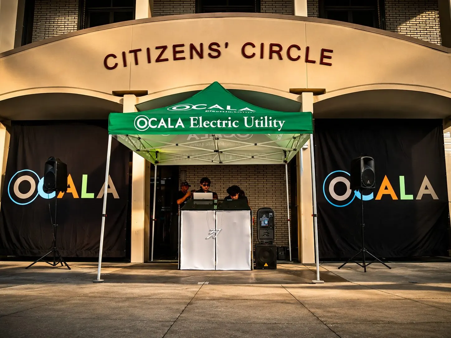 The DJ Studio 37 booth under an Ocala Electric Utility marquee outside Citizens’ Circle